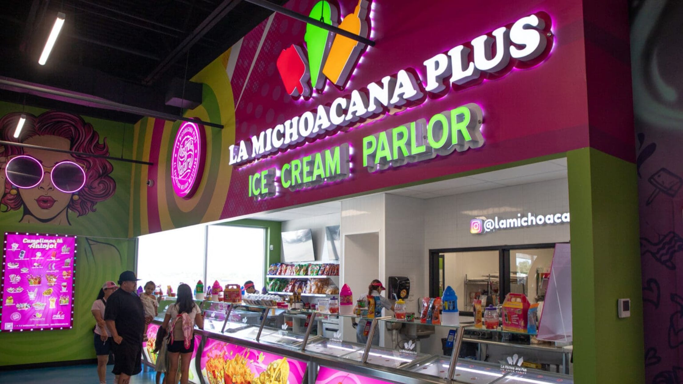 The lively and colorful interior of La Michoacana Plus in Omaha, filled with families and friends.